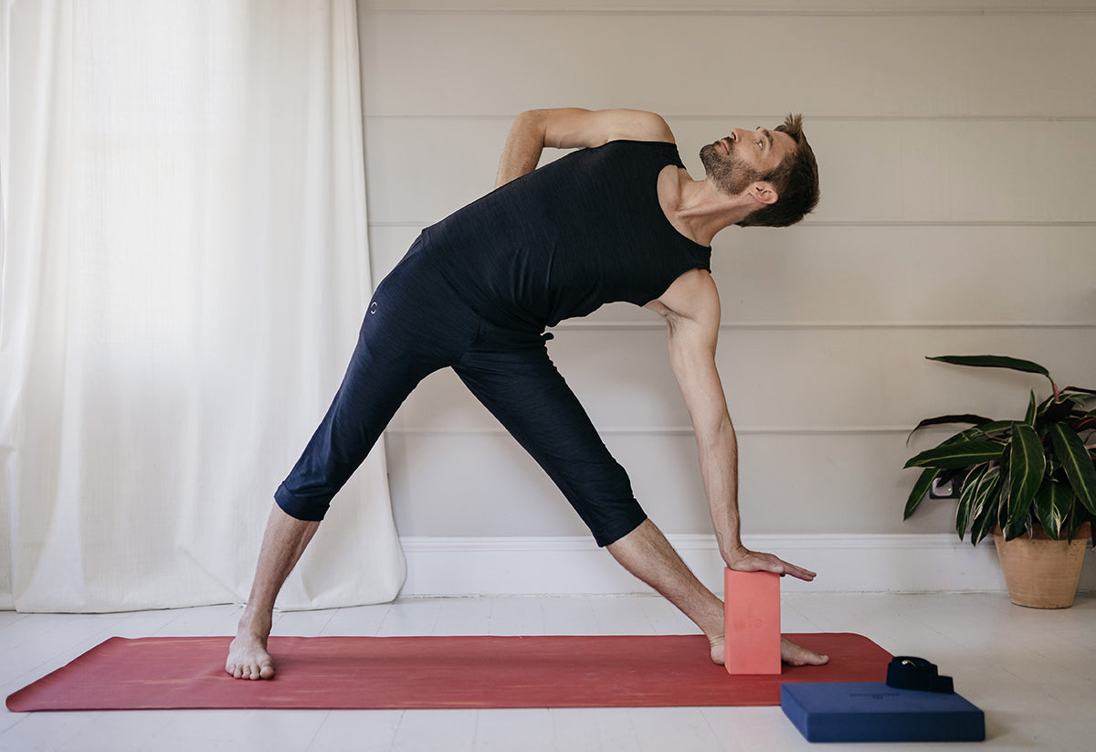 The Meaning Behind Trikonasana: Triangles & The Power of Three