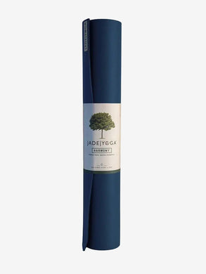 Jade Yoga Harmony Professional Yoga Mat, Navy Blue color, rolled up yoga mat with label, front view on white background.