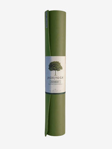 Jade Yoga Harmony olive green yoga mat rolled up with label visible on white background