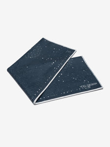 Navy blue Yoga Design Lab yoga mat with constellation pattern, side view on white background, eco-friendly exercise mat for fitness and meditation