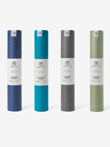 YogaMatters Eco Everyday Yoga Mats front view in navy blue, teal, grey, and green colors, non-slip textured surface, rolled for storage.