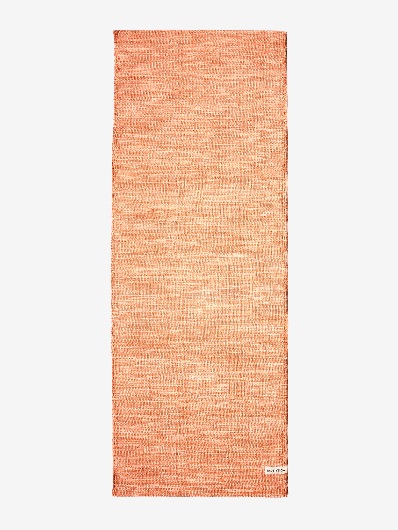 Front view of an orange textured yoga mat by Jade Yoga, eco-friendly, non-slip surface, premium design, studio quality, fitness accessory, shot on a white background.
