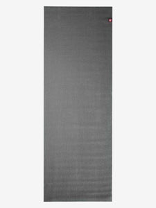 Front view of a gray textured yoga mat with visible logo on top corner, non-slip surface, exercise equipment for fitness and meditation.