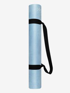 Blue yoga mat with carrying strap, side view, textured design, non-slip surface, exercise equipment, rolled up fitness mat