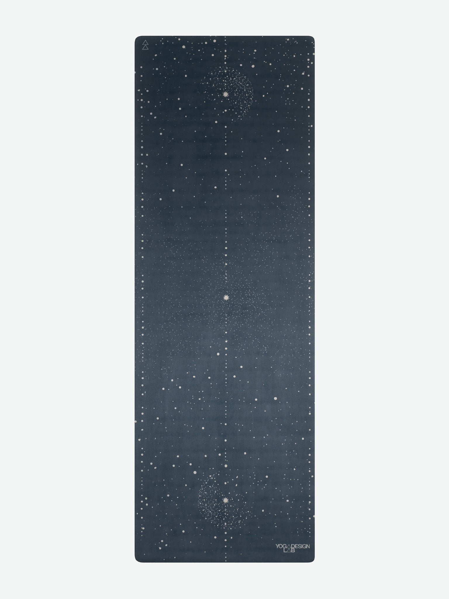 Navy blue yoga mat with cosmic pattern from Yoga Design Lab, non-slip surface, eco-friendly material, front view.