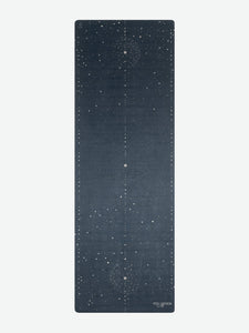 Navy blue yoga mat with cosmic pattern from Yoga Design Lab, non-slip surface, eco-friendly material, front view.