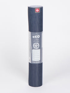 Manduka eKO Lite yoga mat in dark gray, 4mm cushion, eco-friendly material, front view on white background.