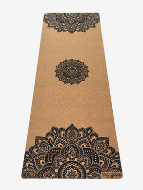 Eco-friendly cork yoga mat with black mandala design by Yoga Design Lab, non-slip surface, shot from front on white background.