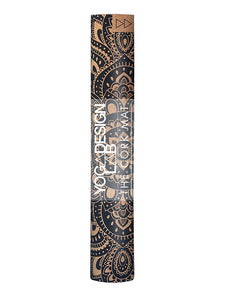 Brown cork yoga mat with black mandala design, side view, eco-friendly non-slip surface, visible text branding, fitness and wellness accessory.