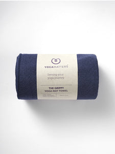 YogaMatters navy blue rolled yoga mat towel with grippy texture, front view on white background.