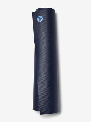 Navy blue textured yoga mat rolled up isolated on white background with visible logo