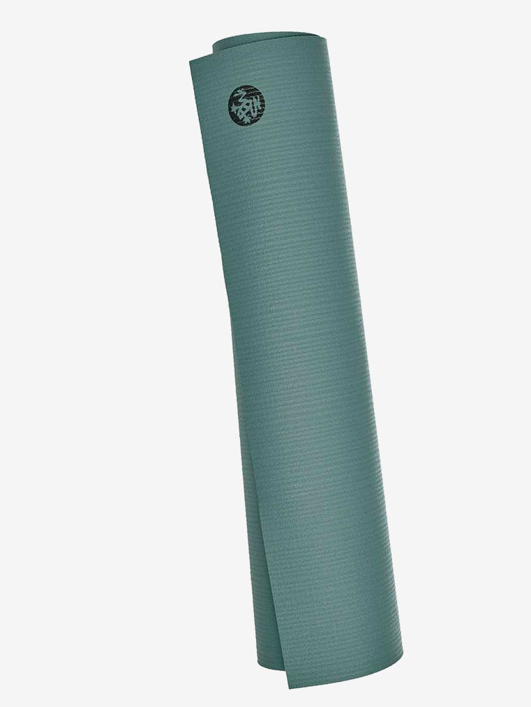 Teal rolled yoga mat with textured surface and circular logo, side view on white background