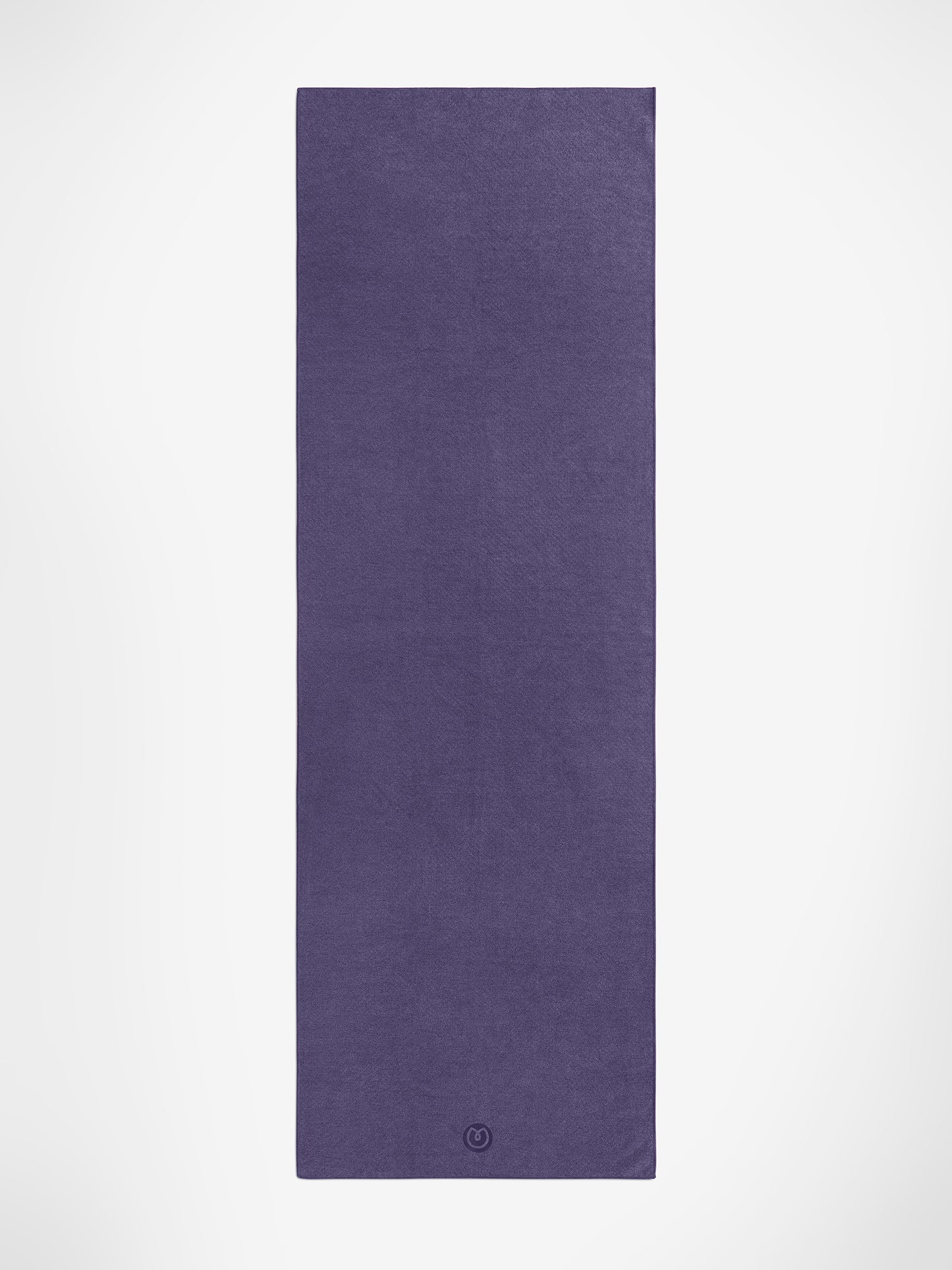 Purple yoga mat front view with textured surface and visible logo fitness equipment for yoga and pilates practice.