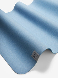 Blue textured yoga mat with Lululemon logo, non-slip grip, front angle view.