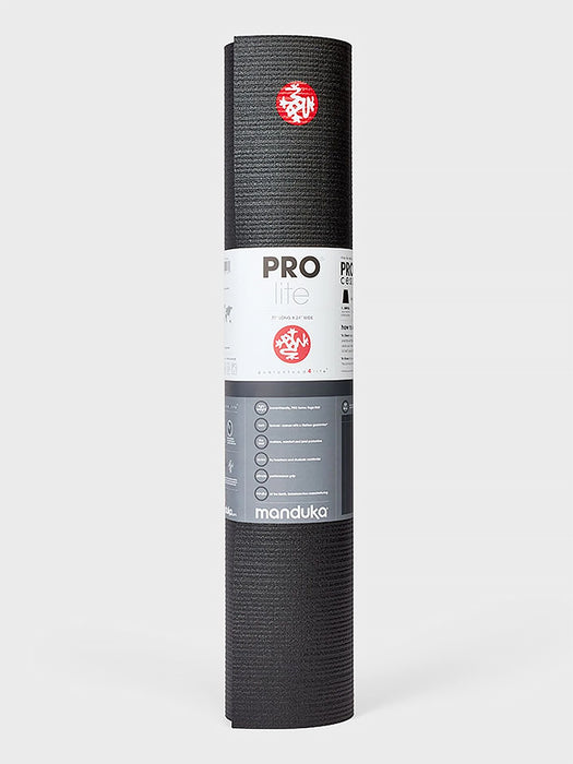 Manduka PROlite yoga mat rolled up, front view on white background, high-density cushion, non-slip grip, eco-friendly, 71-inch long and 24-inch wide, black color with red and white branding logo visible.