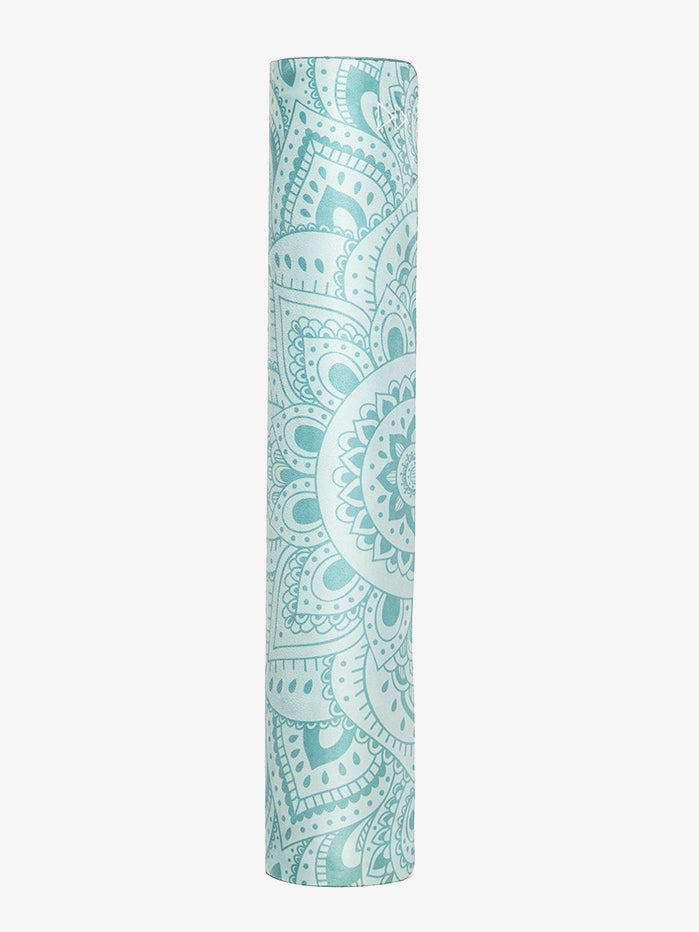 Aqua blue patterned yoga mat rolled up, side view, non-slip textured exercise mat with mandala design for yoga and fitness routines